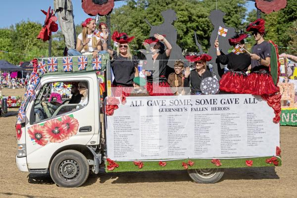 Picture by Peter Frankland. 21-08-25 North Show 2025 Battle of Flowers. Lest We Forget - The QuinBouLlo Crew.