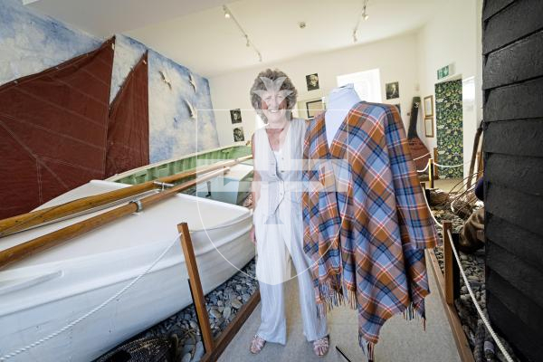 Picture by Peter Frankland. 26-08-25 Katy Barrett has designed a Guernsey Tartan which is inspired by typical local things like cows, donkeys and the Guernsey flag. The launch was at Saumarz Park Folk Museum.