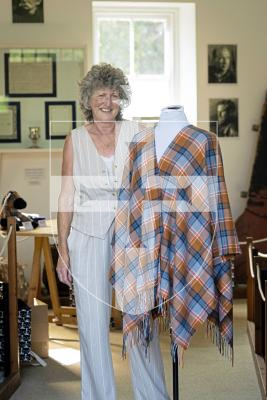 Picture by Peter Frankland. 26-08-25 Katy Barrett has designed a Guernsey Tartan which is inspired by typical local things like cows, donkeys and the Guernsey flag. The launch was at Saumarz Park Folk Museum.
