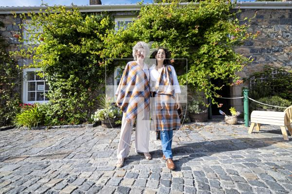Picture by Peter Frankland. 26-08-25 Katy Barrett has designed a Guernsey Tartan which is inspired by typical local things like cows, donkeys and the Guernsey flag. The launch was at Saumarz Park Folk Museum. Pictured with Elainer Laine.