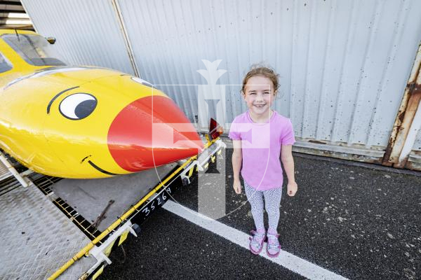 Picture by Sophie Rabey.  31-08-25.  Wings and Wheels event at Guernsey Areo Club.
Verity McKerrell (7) with Joey.