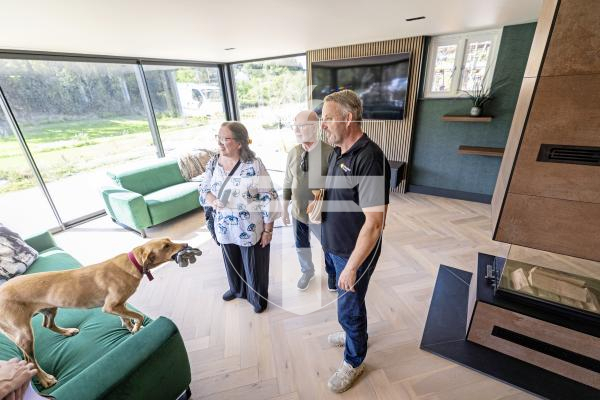 Picture by Sophie Rabey.  02-09-25.  Ken and Wendi Overby are over visiting Guernsey from the US and trying to trace back Wendi's family history.  Her family used to live at Les Galliennes in Talbot Valley, the lovely farmhouse belonging to Darren Etasse and his family.  They had a tour around the premises today.