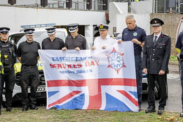 Picture by Sophie Rabey.  09-09-25.  A two minute silence was held at Beau Sejour with representatives from Bailiwick Law Enforcement, the Guernsey Fire & Rescue Service, St John Ambulance and Rescue Service, the Joint Emergency Services Control Centre, Guernsey Coastguard, Airport Fire Service, Guernsey Civil Protection, RNLI Lifeboat and Channel Islands Air Search, to mark Emergency Services Day or '999 Day'.