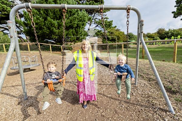 Picture by Sophie Rabey.  09-09-25.   St Sampson's douzenier Kim Abbotts at Delancey Park to give update on what the response has been of the new fencing around the childrens play area.
Kim with 1year old Xander (left) and 10month old Vinnie (right).