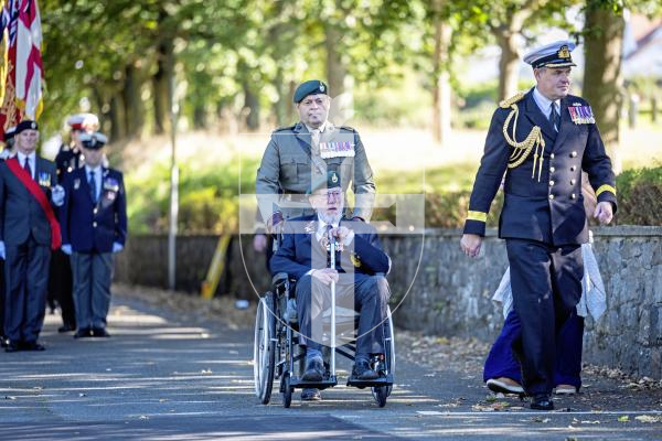 Picture by Peter Frankland. 28-09-25 HMS Charybdis and HMS Limbourne memorial service at Le Foulon Cemetery. The parade arrives. John Eskdale, a Royal Marine who was aboard HMS Charybdis when she was sunk by German torpedoes on October 23, 1943.