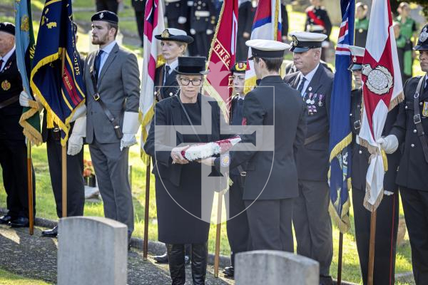 Picture by Peter Frankland. 28-09-25 HMS Charybdis and HMS Limbourne memorial service at Le Foulon Cemetery. Deputy Bailiff Jessica Roland.