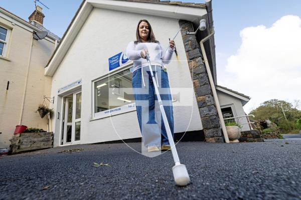 Picture by Peter Frankland. 08-10-25 Guernsey Blind Association are hoping to raise awareness of the white cane for the visually impaired and is holding a White Cane Walk around St Peter Port this weekend. Chantelle Tucker.