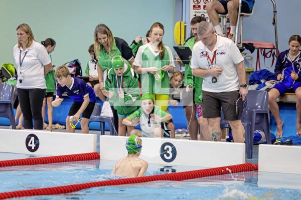 Picture by Peter Frankland. 22-11-25 Swimming at Beau Sejour. Channel Islands Championships. Chearing on Jude Marley in the 100 breaststroke.