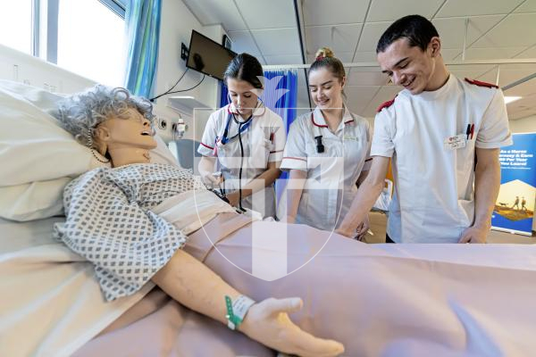 Picture by Peter Frankland. 21-11-25 TGI University Centre at the PEH. Students demonstrating some of the kit they have at the centre. L-R - Lauren de Jersey, Kayleigh Moullin and Thomas Rohland. All student nurses.