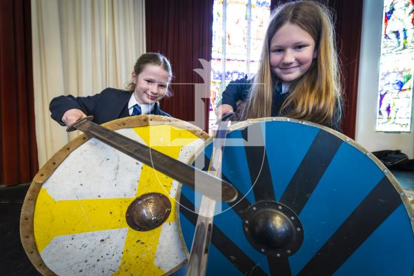 Picture by Peter Frankland. 16-03-26 Re-enactment group Tol Galen visiting Elizabeth College to show them medieval fighting techniques. L-R - Imogen Costen, 11 and Rose Brokenshire, 12.