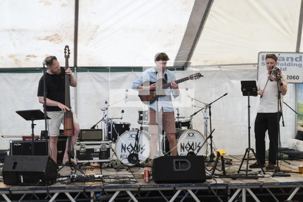 Picture by Peter Frankland. 22-08-26 Lions Club of Guernsey Donkey Derby 2026 at Saumarez Park. Rumpus play in the beer tent.