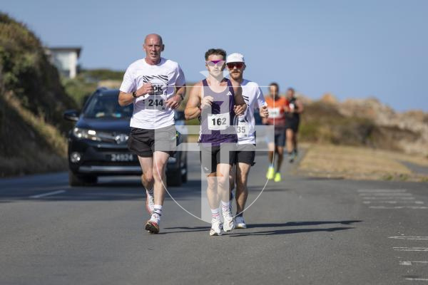 Picture by Peter Frankland. 23-08-26 Mind 10k run from Pleinmont to Grandes Rocques.