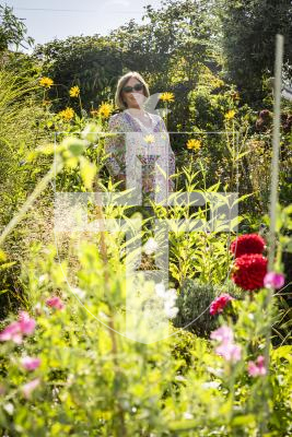 Picture by Sophie Rabey.  27-08-26.  Jacqui Williams in her garden that won first place in the Island Garden Competition.