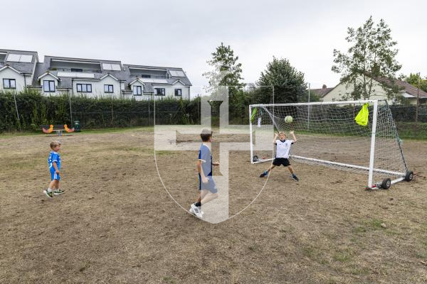 Picture by Sophie Rabey.  02-09-26.  The Sports Commission have managed to get some football goals in the field in St Martins next to Rue Jehannet estate for children to enjoy.  
L-R Carter Williams (4), Parker Williams (10) and Leo Burbridge (6).
