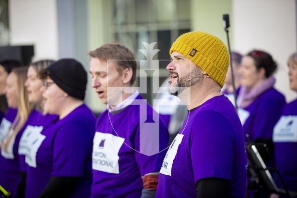 Picture by Peter Frankland. 15-01-23 GADOC are singing away the January blues in Market Square. The event aims to uplift and promote mental well-being. Foreground is Tim Langlois.