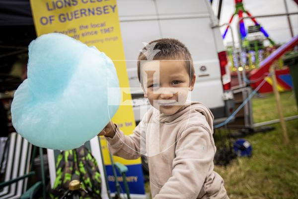 Picture by Sophie Rabey.  25-05-24.  Guernsey Together Festival 2024.
Keogh Walker (4) enjoying his Candy Floss.