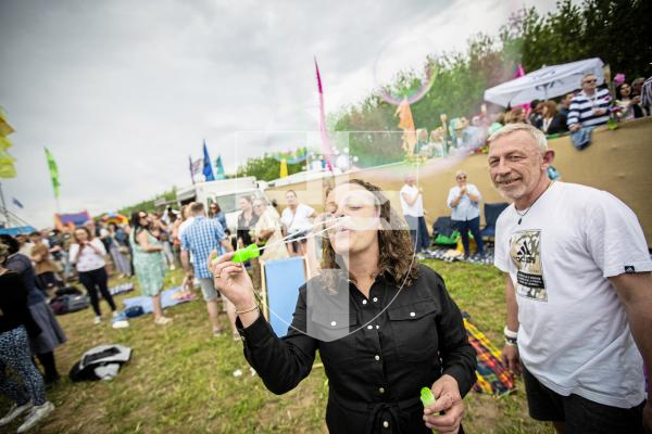 Picture by Sophie Rabey.  25-05-24.  Guernsey Together Festival 2024.
Julie McLaren blowing bubbles.