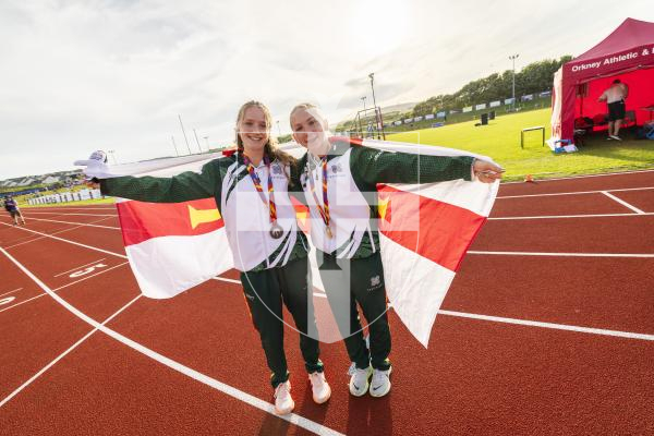 Picture by Sophie Rabey.  17-07-25.  ISLAND GAMES 2025 in Orkney.  
Athletics - Rhiannon Dowinton and Victoria Hancock won Gold and Bronze for Guernsey in the Women 100m Hurdles.