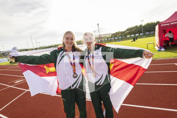 Picture by Sophie Rabey.  17-07-25.  ISLAND GAMES 2025 in Orkney.  
Athletics - Rhiannon Dowinton and Victoria Hancock won Gold and Bronze for Guernsey in the Women 100m Hurdles.