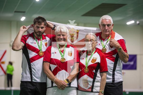 Picture by Luke Le Prevost. 13-07-23.
Island Games 2023 - Bowls at Hougue du Pommier. Medal Ceremony. Open Pairs Final. L-R Bronze medalists Luke Le Sueur, Sally Black, Jean Holmes and Cyril Renouf