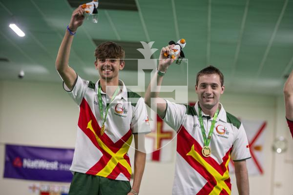 Picture by Luke Le Prevost. 13-07-23.
Island Games 2023 - Bowls at Hougue du Pommier. Medal Ceremony. Open Pairs Final. L-R Gold medalists Bradley Le Noury and Joshua Bonsall