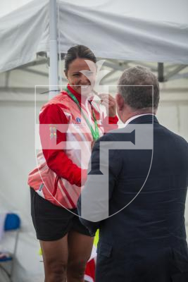 Picture by Luke Le Prevost. 14-07-23.
Island Games 2023 - Cycling Criterium Medal Ceremony at Crown Pier. Women's Individual. L-R Bronze medalist Elaine Pratts (Gibraltar) awarded by Lt Governor Richard Cripwell