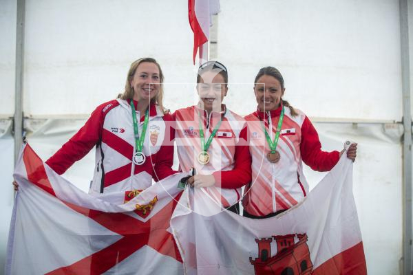 Picture by Luke Le Prevost. 14-07-23.
Island Games 2023 - Cycling Criterium Medal Ceremony at Crown Pier. Women's Individual. L-R Silver medalist Flo Thomas (Jersey), gold medalist Olivia Lett (Gibraltar) and bronze medalist Elaine Pratts (Gibraltar)