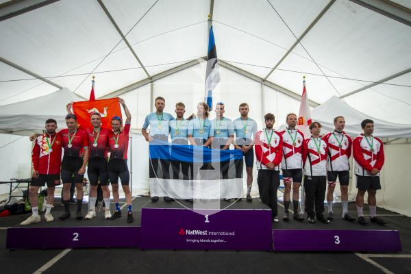 Picture by Luke Le Prevost. 14-07-23.
Island Games 2023 - Cycling Criterium Medal Ceremony at Crown Pier. Men's team. L-R Silver medalists Isle of Man, gold medalists Saaremaa and bronze medalists Jersey