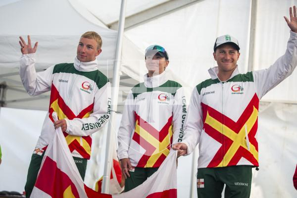 Picture by Luke Le Prevost. 14-07-23.
Island Games 2023 - Triathlon Relay Medal Ceremony at Crown Pier. Silver medalists Guernsey L-R Thierry Le Cheminant, Megan Chapple and Joshua Lewis