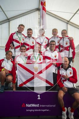Picture by Luke Le Prevost. 14-07-23.
Island Games 2023 - Triathlon Relay Medal Ceremony at Crown Pier. Gold medalists Jersey
