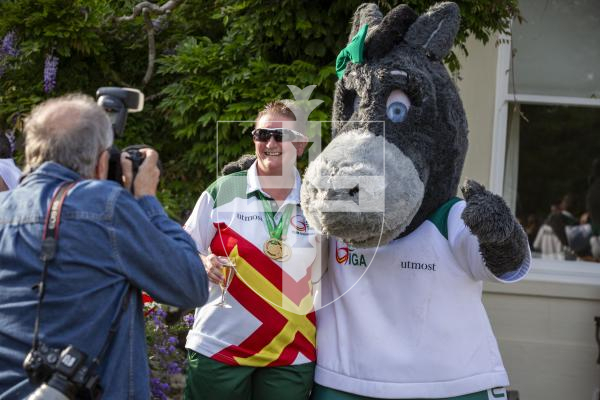Picture by Luke Le Prevost. 20-07-23.Vin d'Honneur at Government House - Island Games Guernsey 2023 athletes, organisers and volunteers gathered to celebrate their achievements. Ali Merrien and Darcy the Donkey