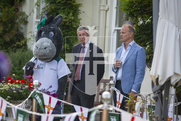 Picture by Luke Le Prevost. 20-07-23.Vin d'Honneur at Government House - Island Games Guernsey 2023 athletes, organisers and volunteers gathered to celebrate their achievements. L-R Darcy the Donkey, The Bailiff, Sir Richard McMahon and representative from Utmost International