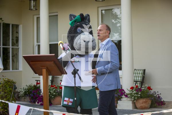Picture by Luke Le Prevost. 20-07-23.Vin d'Honneur at Government House - Island Games Guernsey 2023 athletes, organisers and volunteers gathered to celebrate their achievements. L-R Darcy the Donkey and a representative from Utmost International