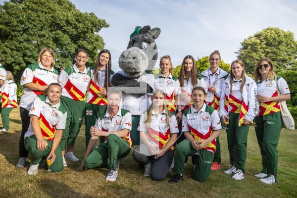 Picture by Luke Le Prevost. 20-07-23.Vin d'Honneur at Government House - Island Games Guernsey 2023 athletes, organisers and volunteers gathered to celebrate their achievements. Darcy the Donkey with the women's football team