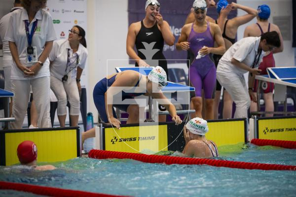 Picture By Peter Frankland. 13-07-23 Guernsey NatWest International Island Games 2023. Swimming Day Four. Celebration at the end of the 4x100 medley relay. Ailish Rabey in the water with Orla Rabey, Tatiana Tostevin and Laura Le Cras behind.