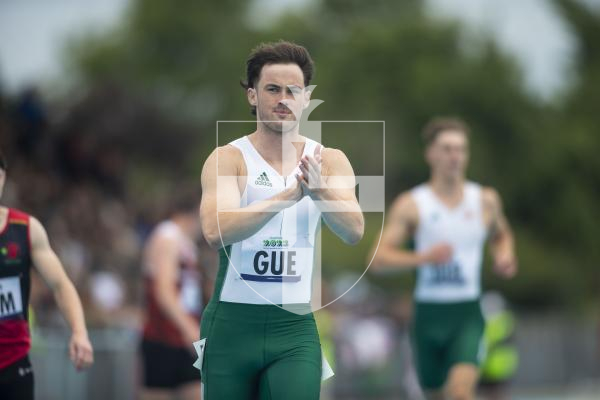 Picture By Peter Frankland. 14-07-23 Guernsey International Island Games 2023. Footes Lane - Athletics. A disappointed Joe Chadwick applauds the crowd after the team dropped the baton in the 4x100m relay.