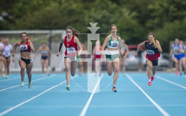 Picture By Peter Frankland. 14-07-23 Guernsey International Island Games 2023. Footes Lane - Athletics. Rebecca Toll brings the baton home for Guernsey in the 4x100m relay,