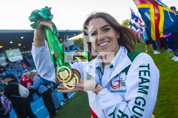Picture By Peter Frankland. 14-07-23 Guernsey International Island Games 2023. Closing Ceremony at Footes Lane. Golden girl Orla Rabey with her clutch of 9 medals.