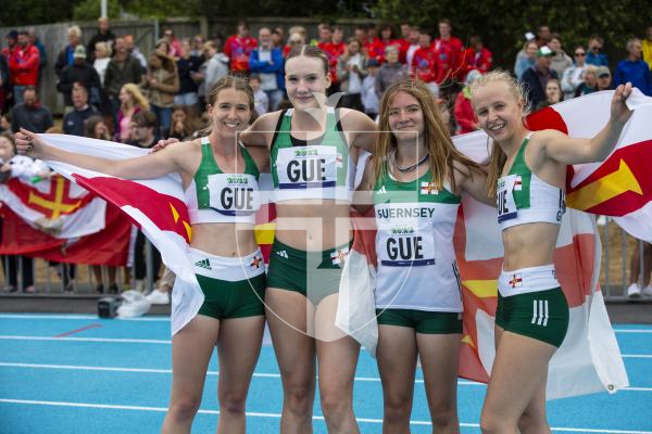 Picture By Peter Frankland. 14-07-23 Guernsey International Island Games 2023. Footes Lane - Athletics. Women's 4x100m relay. L-R - Rebecca Toll, Tilly Beddow, Emily Pike and Abi Galpin.