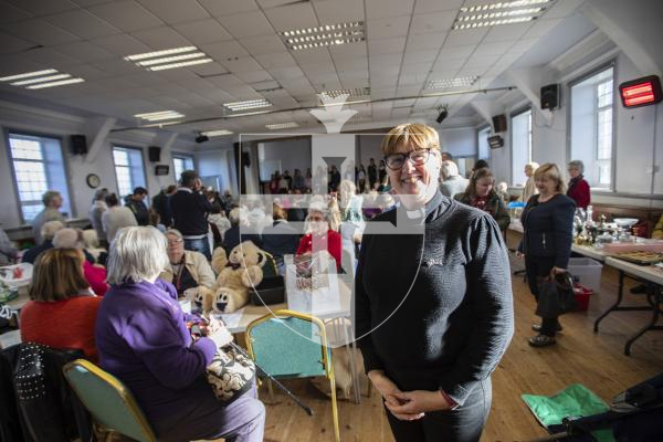 Picture by Sophie Rabey.  25-11-23.  Christmas Fayre at Vale Church Hall selling homemade cakes, books, raffle etc.  There was also a childrens choir singing christmas songs for everyone to enjoy.
The Rev. Beverley Herve.