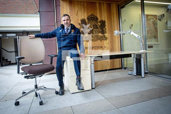Picture by Peter Frankland. 31-01-24 Elizabeth College Bursar, James Couchman with some of the old furniture from the former Royal Bank of Canada building the school is giving away on Saturday.