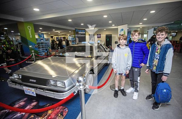 Picture by Peter Frankland. 04-02-24 Screening of Back to the Future at Beau Sejour. A replica De Lorian time machine is over. L-R - Charlie Dowding, 10, Idris Rees, 11 and Oliver Blundell, 11.