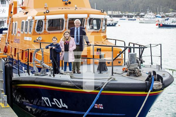 Picture by Peter Frankland. 13-02-24 A1 Crab supplies have raised over £22k for the RNLI by holding a raffle. Today the money was handed over by Louise Le Gallais, 10 and Axel Le Gallais, 9 (the children of Bernie Le Gallais who owns A1 Crab supplies) to Jim Le Pelley, Chairman of the RNLI Guernsey.