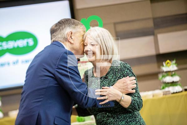 Picture by Sophie Rabey.  14-02-24.  Today marks Dame Mary Perkins 80th birthday and the 40th anniversary of the first Specsavers store.
A presentation was made to Doug and Mary Perkins at Specsavers HQ with all of the staff in attendance.