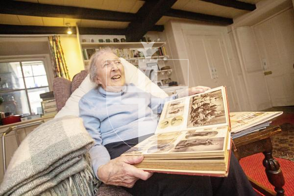 Picture by Sophie Rabey.  15-02-24.  Interview with Jennifer Jee (92), she is the last relative to have really known Marie Randall MBE and recalls her memories.
Jennifer holding a scrapbook of old family photos.