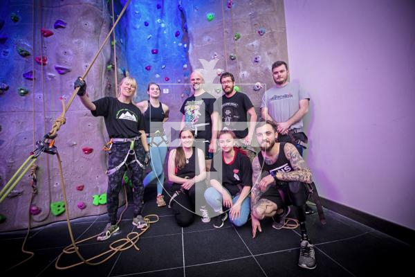 Picture by Peter Frankland. 24-02-24 Last day of the Everest Challenge climbing at Baubigny Schools. L-R - back -  Nathalie Lovell (learning support assistant at Le Murier School), Joely Culverwell, Joe Raleigh, Dave Wratten, Michael McGinn, front - Jade Goracy, Laura Sebire and Alain Branquet.