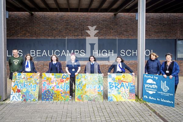Picture by Peter Frankland. 26-02-24 Beaucamp School Friday Art Group have been painting signs to promote good mental health which will be displayed at the L'Eree Bay Hotel.
L-R - Art teacher Robert Sweeney, Lilah Armsden, 13, Josie Young, 12, Sian Jones, Yara Goncalves, 12, Evelyn Prigent, 12, Catharine Walter, Chair of Ravenscroft Red Fund and Louise Leale, CEO of Youth Commission.