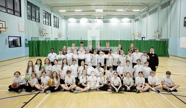 Picture by Peter Frankland. 27-02-24 Yr 7 St. Sampson's High School pupils have been taking part in lunchtime sport sessions with students from the Guernsey Institute who are studying Level 3 BTE.