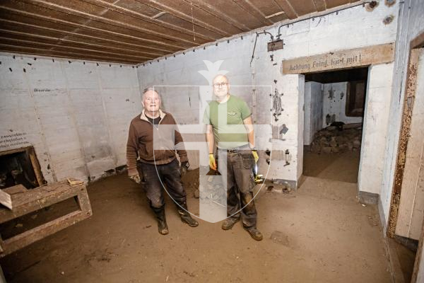 Picture by Sophie Rabey.  02-03-24.  Festung Guernsey have started a dig at the L’Ancresse east bunker.
Festung volunteers L-R Ken Crosby and Ben Drew pictured down into the bunker rooms.
