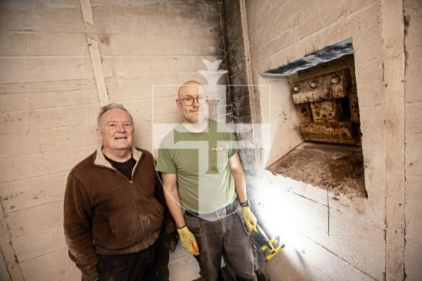 Picture by Sophie Rabey.  02-03-24.  Festung Guernsey have started a dig at the L’Ancresse east bunker.
Festung volunteers L-R Ken Crosby and Ben Drew pictured down into the bunker rooms.